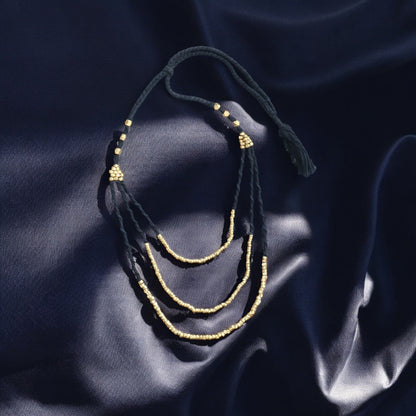 Handcrafted Dhokra beaded choker necklace with geometric brass beads; ethically made by Odisha artisans using ancient lost-wax casting. A sustainable bohemian statement piece for v-neck tops or ethnic dresses by KalaKart