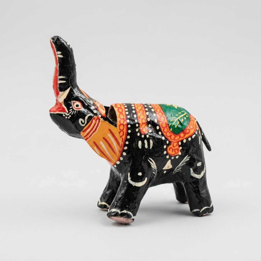 Handmade black bobblehead elephant showpiece in paper mache, hand-painted in Pattachitra style. 8-inch Odisha folk art for home decor and gifting.