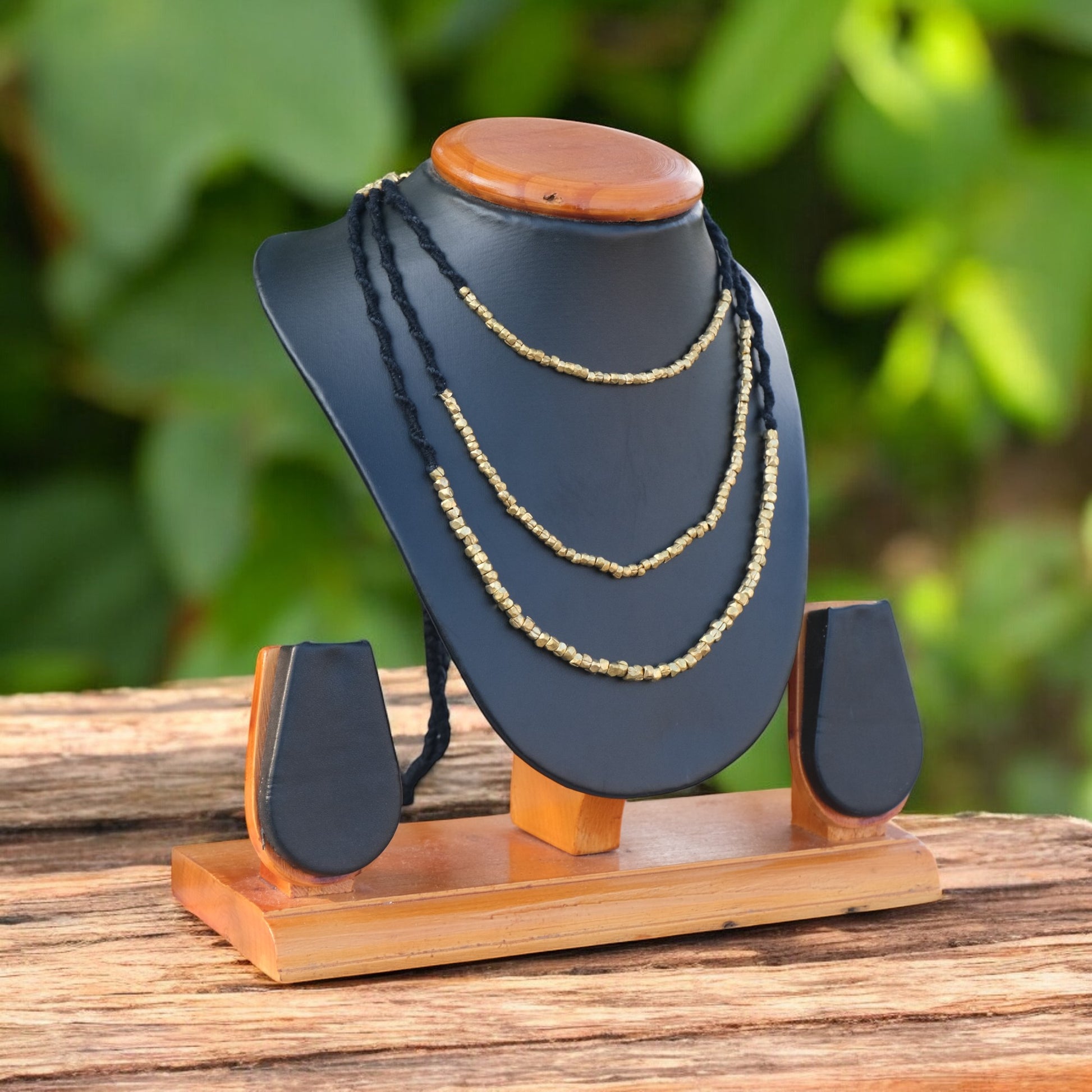 Handcrafted Dhokra beaded choker necklace with geometric brass beads; ethically made by Odisha artisans using ancient lost-wax casting. A sustainable bohemian statement piece for v-neck tops or ethnic dresses by KalaKart