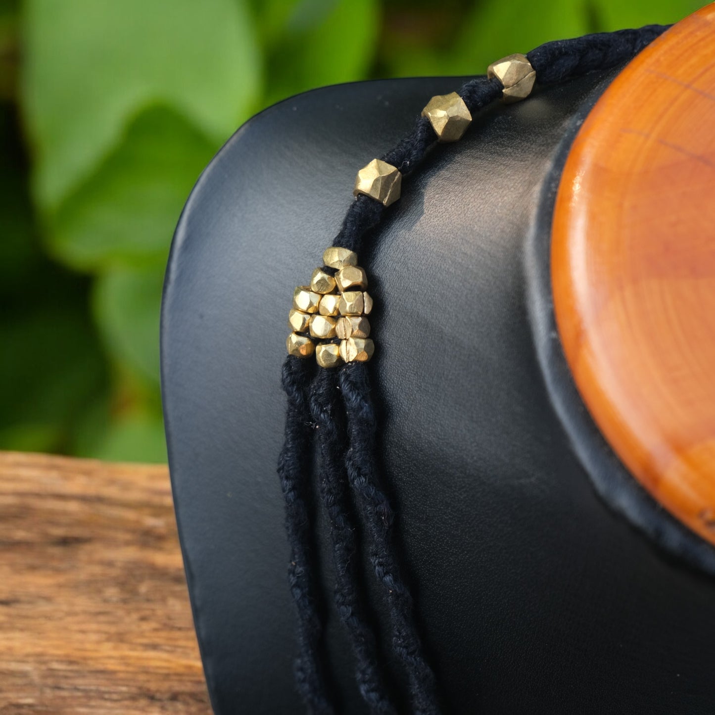Handcrafted Dhokra beaded choker necklace with geometric brass beads; ethically made by Odisha artisans using ancient lost-wax casting. A sustainable bohemian statement piece for v-neck tops or ethnic dresses by KalaKart