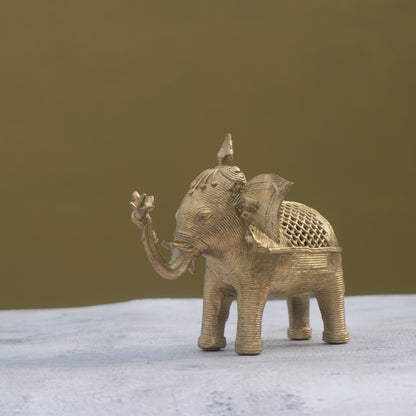 Nuagaon Dhokra Elephant Holding Lotus — Handcrafted Lost-Wax Brass Showpiece