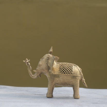 Nuagaon Dhokra Elephant Holding Lotus — Handcrafted Lost-Wax Brass Showpiece