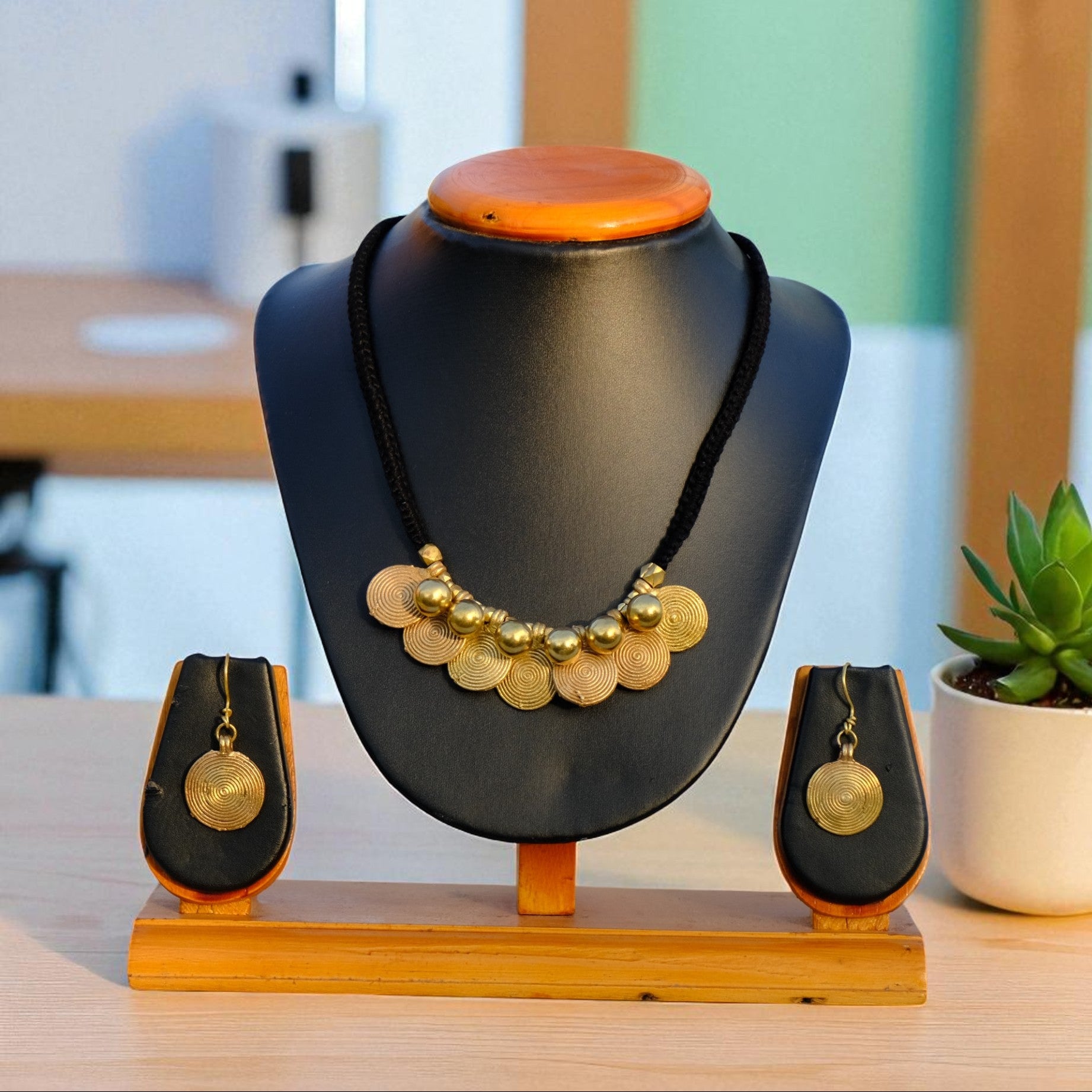 Authentic Odisha Dhokra jewelry set featuring traditional tribal motifs; 4000-year-old ancient metal craft technique by KalaKart.