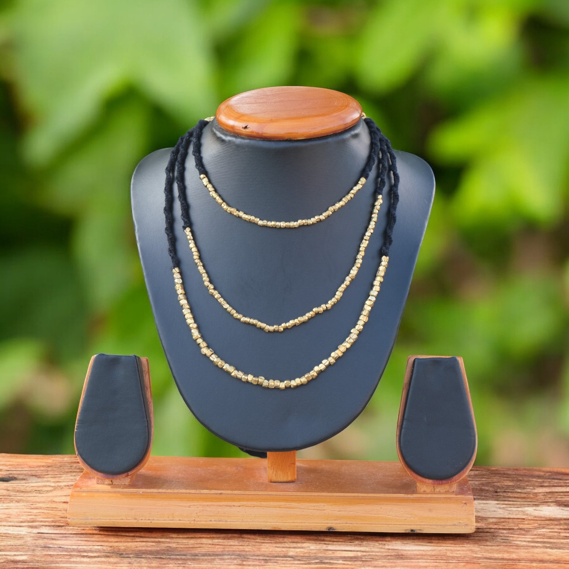 Handcrafted Dhokra beaded choker necklace with geometric brass beads; ethically made by Odisha artisans using ancient lost-wax casting. A sustainable bohemian statement piece for v-neck tops or ethnic dresses by KalaKart