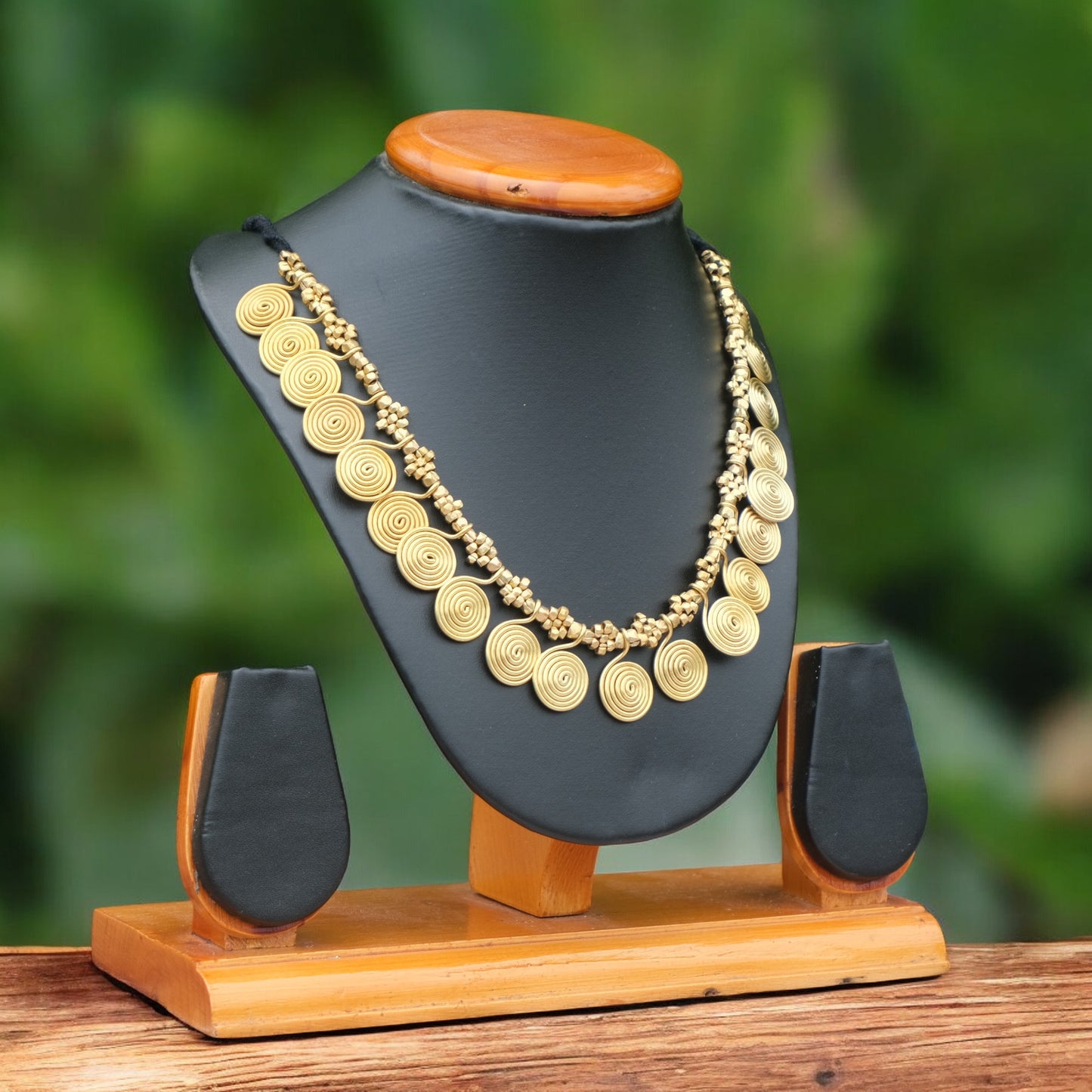 Handcrafted Dhokra golden beaded necklace featuring a circular design; ethically made by Odisha artisans using ancient lost-wax casting. A sustainable everyday statement piece for white linen shirts or tunics by KalaKart
