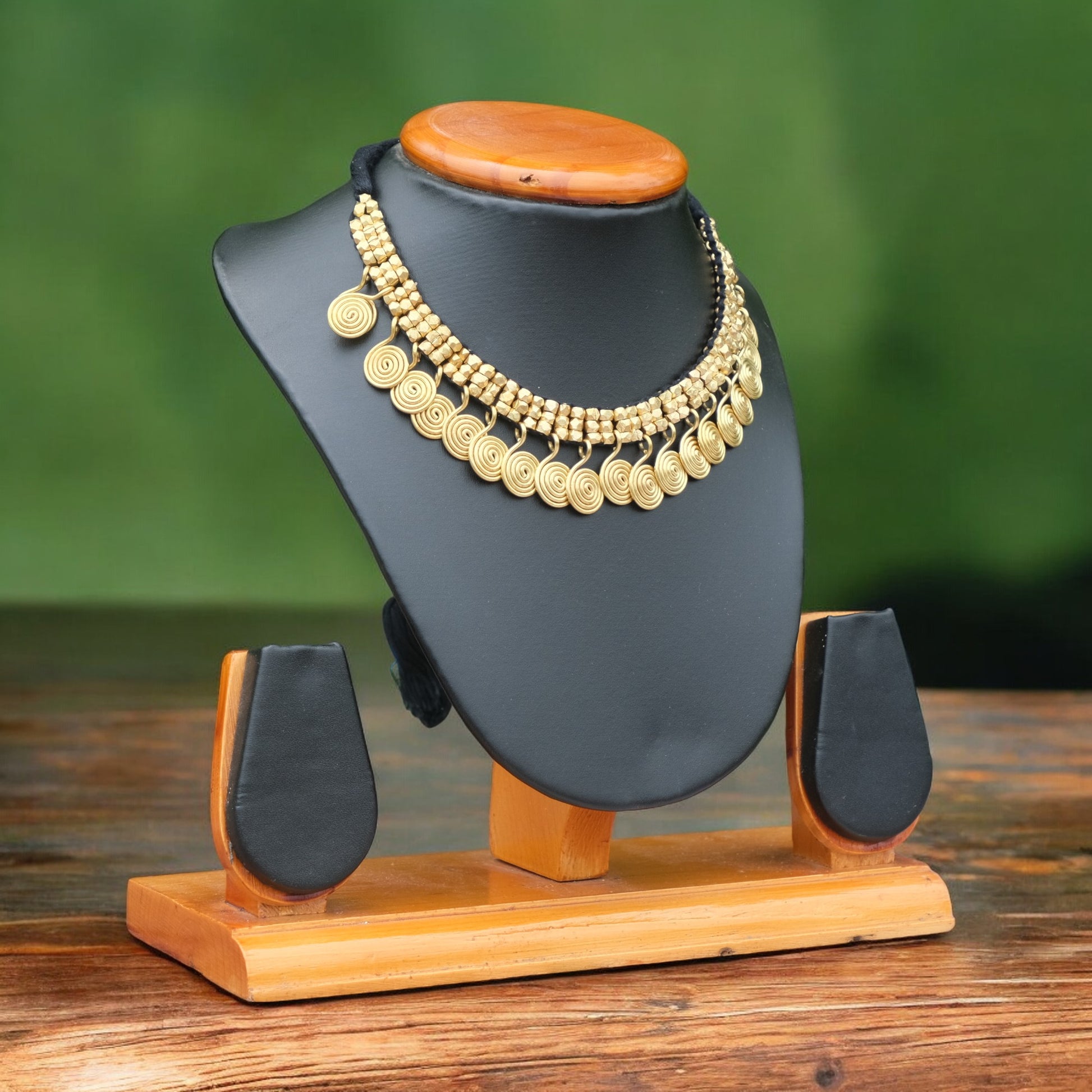 Handcrafted Golden Dhokra beaded necklace with a tribal design; ethically made by Odisha artisans using ancient lost-wax casting. A sustainable festive statement piece for handloom sarees by KalaKart.