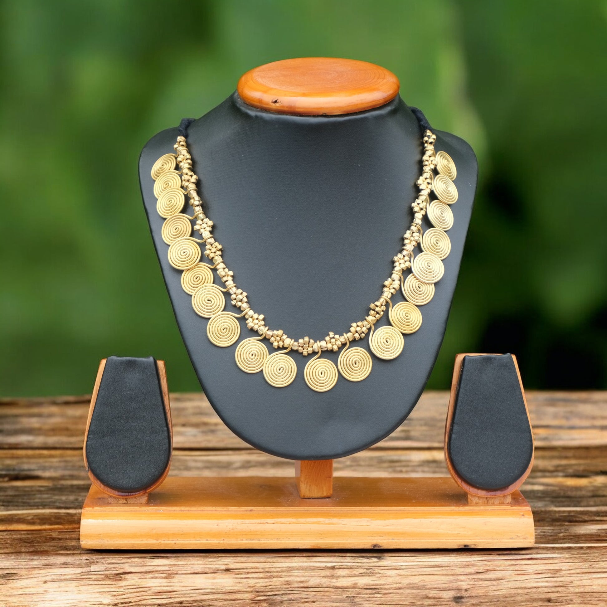 Handcrafted Dhokra golden beaded necklace featuring a circular design; ethically made by Odisha artisans using ancient lost-wax casting. A sustainable everyday statement piece for white linen shirts or tunics by KalaKart